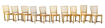 157. A SET OF TEN PINE CHAIRS,