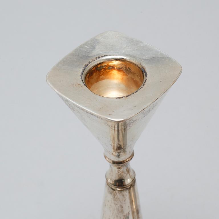 A pair of candlesticks by Thore Eldh for K&EC in Göteborg, 1960s.