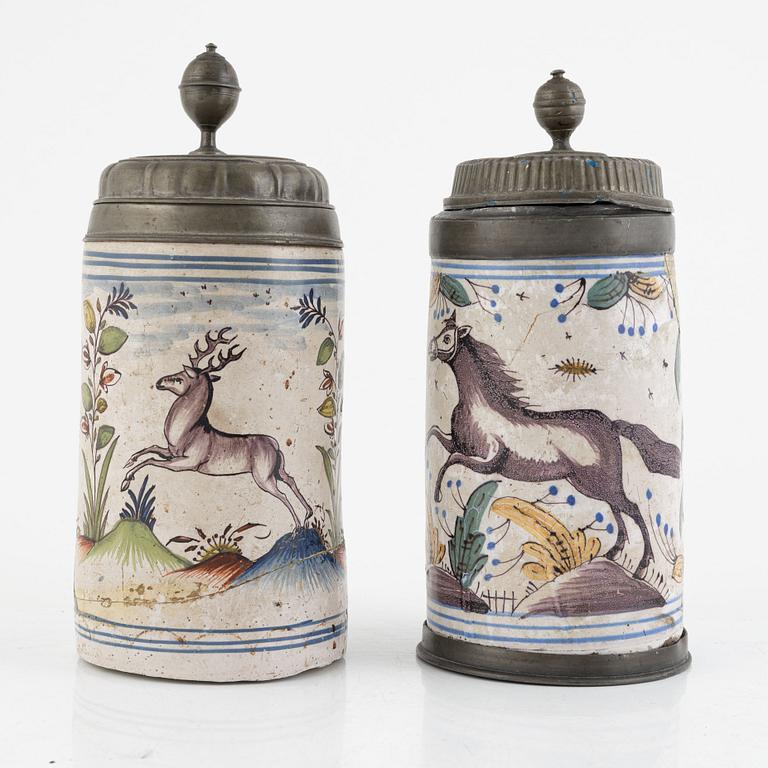 Two earthenware tankards, Germany, 18th century.