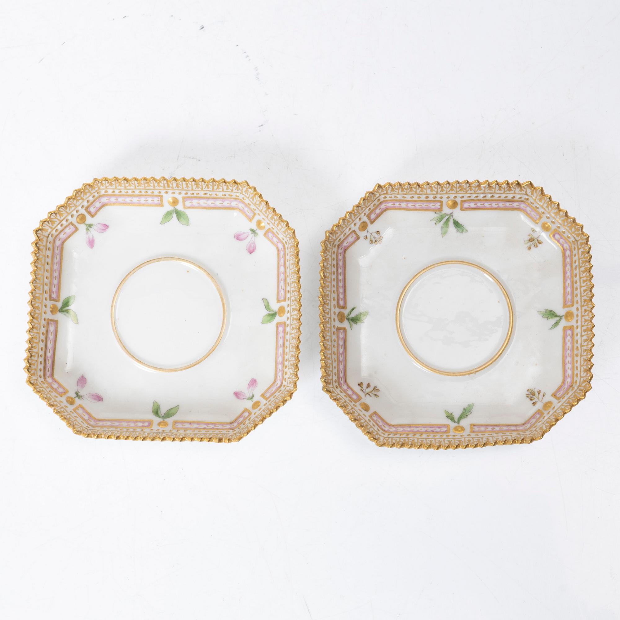 A pair of Royal Copenhagen 'Flora Danica' custard cups with covers and stands, Denmark, 20th century.