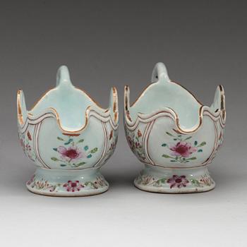 A pair of famille rose 'double peacock' sauce boats, Qing dynasty, Qianlong (1736-95).