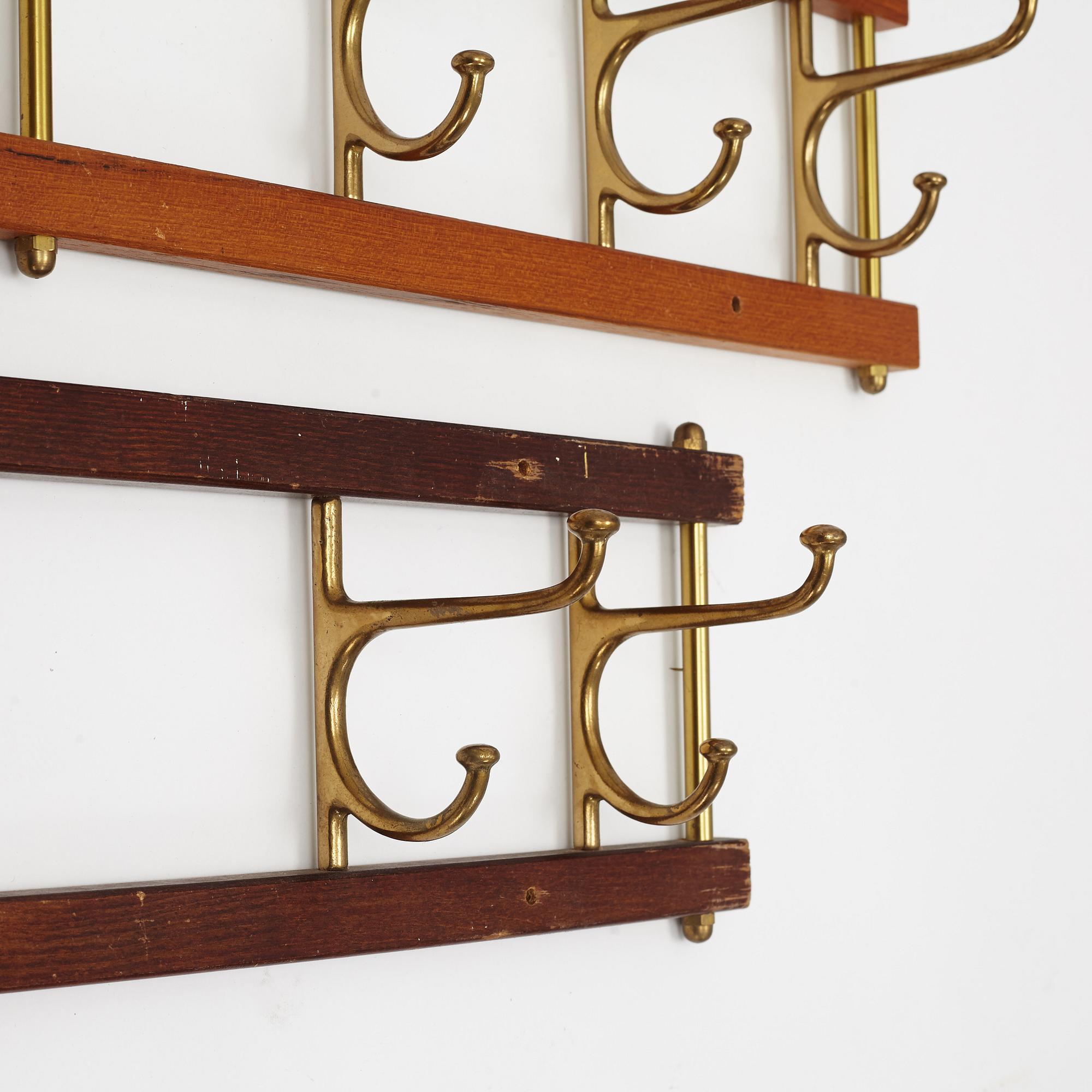 Two 'Dekorativ' coat hangers, Skogslunds metallgjuteri, Anderstorp, mid 20th Century.