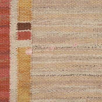 A flat weave carpet, c. 360 x 265 cm.