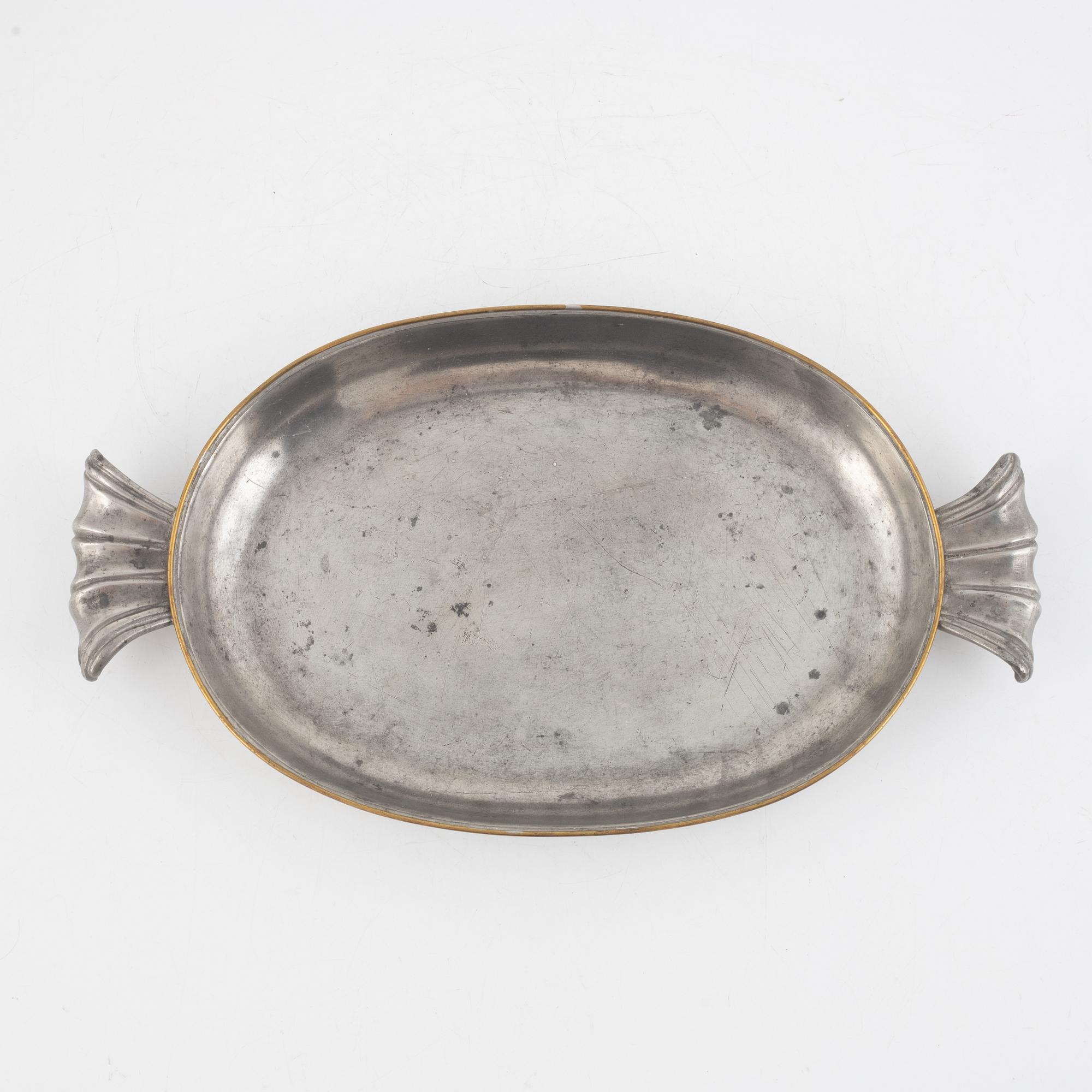 Firma Svenskt Tenn, a pewter and brasstray, Stockholm 1927.