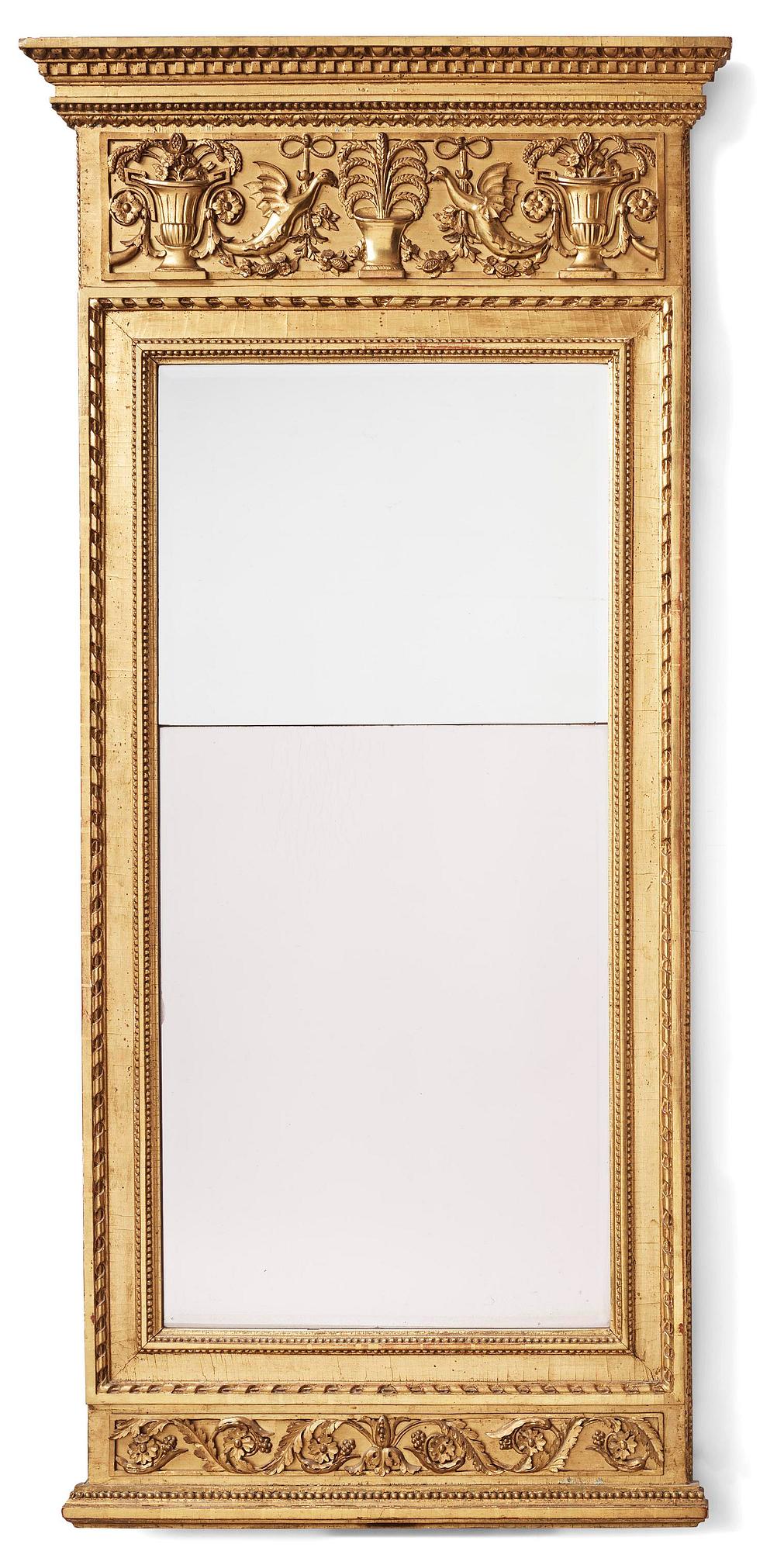 A late-Gustavian giltwood mirror, Stockholm, late 18th century.