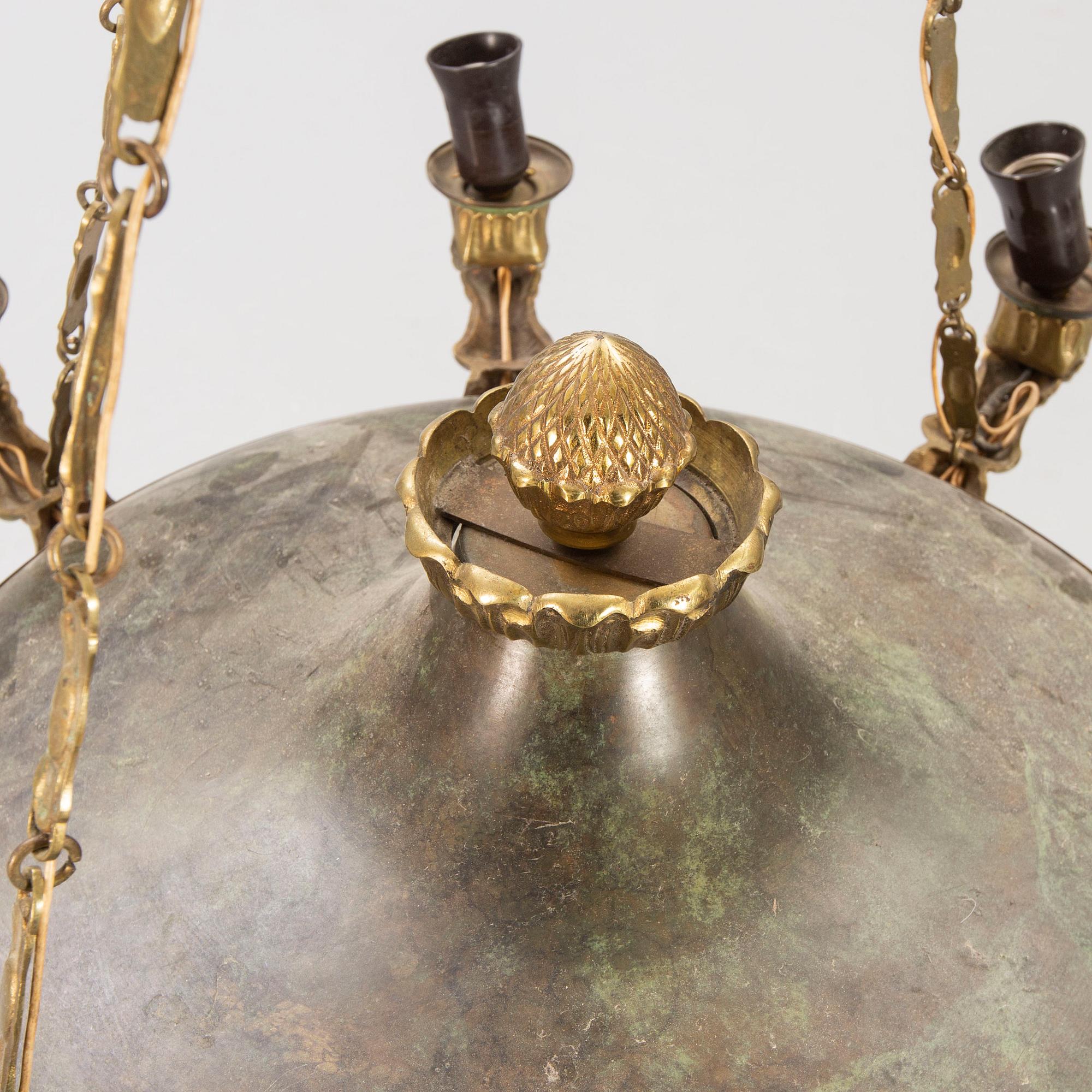 An empires style mid 1900s celing pendant.