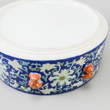 A Chinese polychrome porcelain food container, mid 20th century.