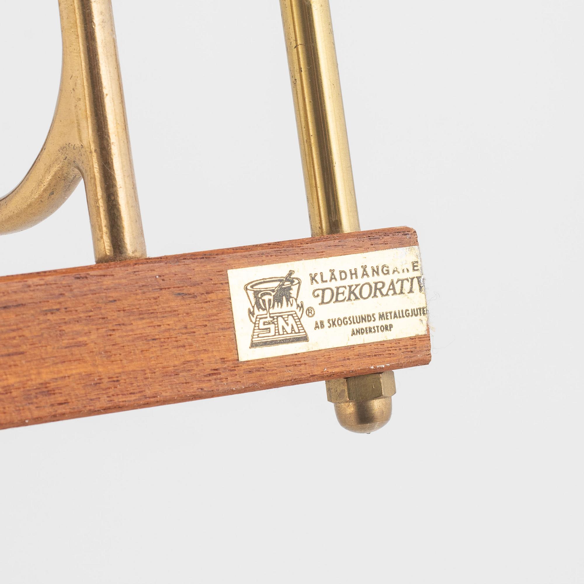 Klädhängare, "Dekorativ", Skoglunds metallgjuteri, Anderstorp, 1900-talets mitt.