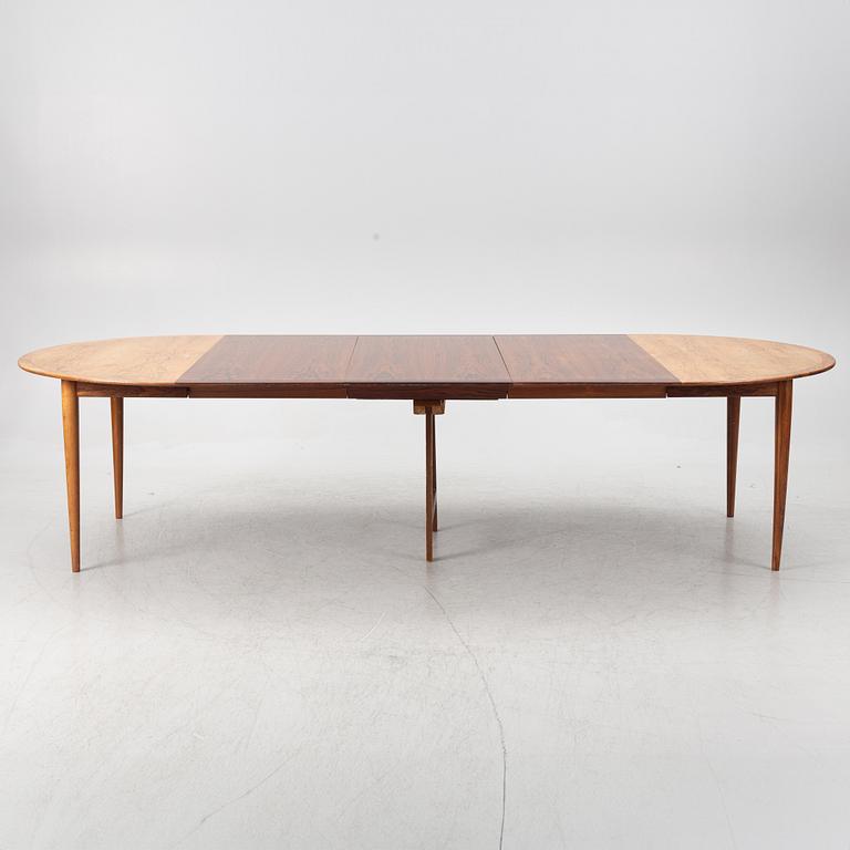 Niels Otto Møller, a rosewood dining table and eight rosewood chairs, Poul Jeppesen & JL Möller, Denmark, 1960's.
