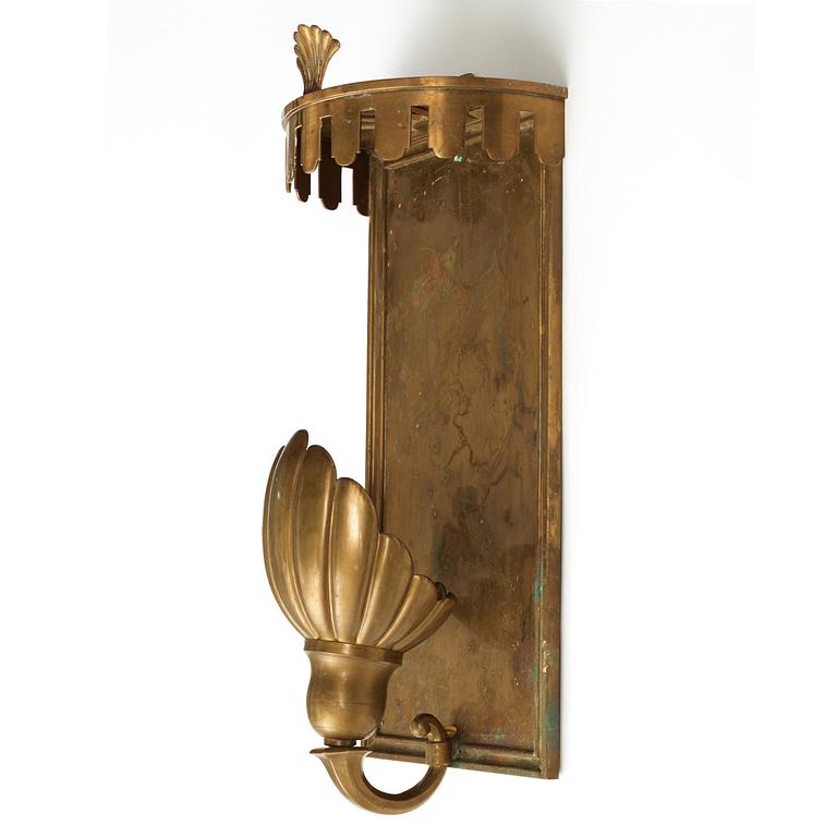 A pair of patinated brass wall lights, Sweden 1920's-30's.