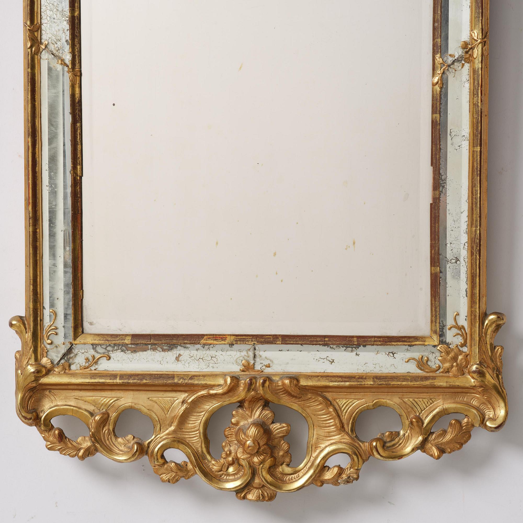 A rococo giltwood mirror, Stockholm, later part 18th century.