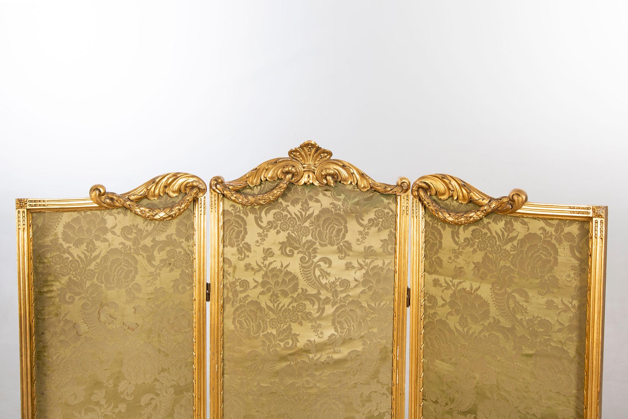 A Louis XVI-styel folding screen beginning of the 20th century.