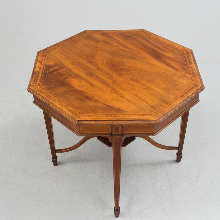 A 1920/30s Swedish Grace sofa, a pair of chairs, a pair of armchairs and a table veneered with mahogany.