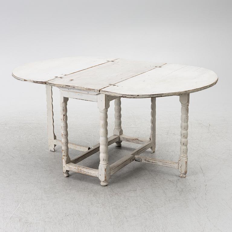 A drop-leaf table, 19th century.