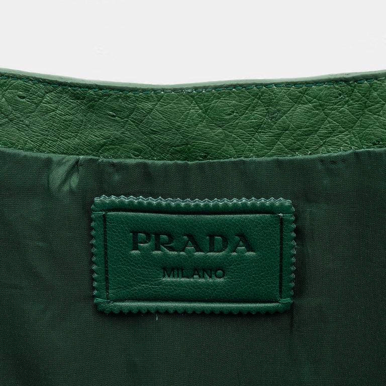Prada, a ostrich leather jacket and dress, size 36.