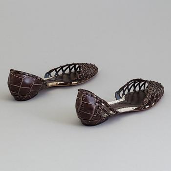 a pair of sandals by Goirgio armani, in size 40.