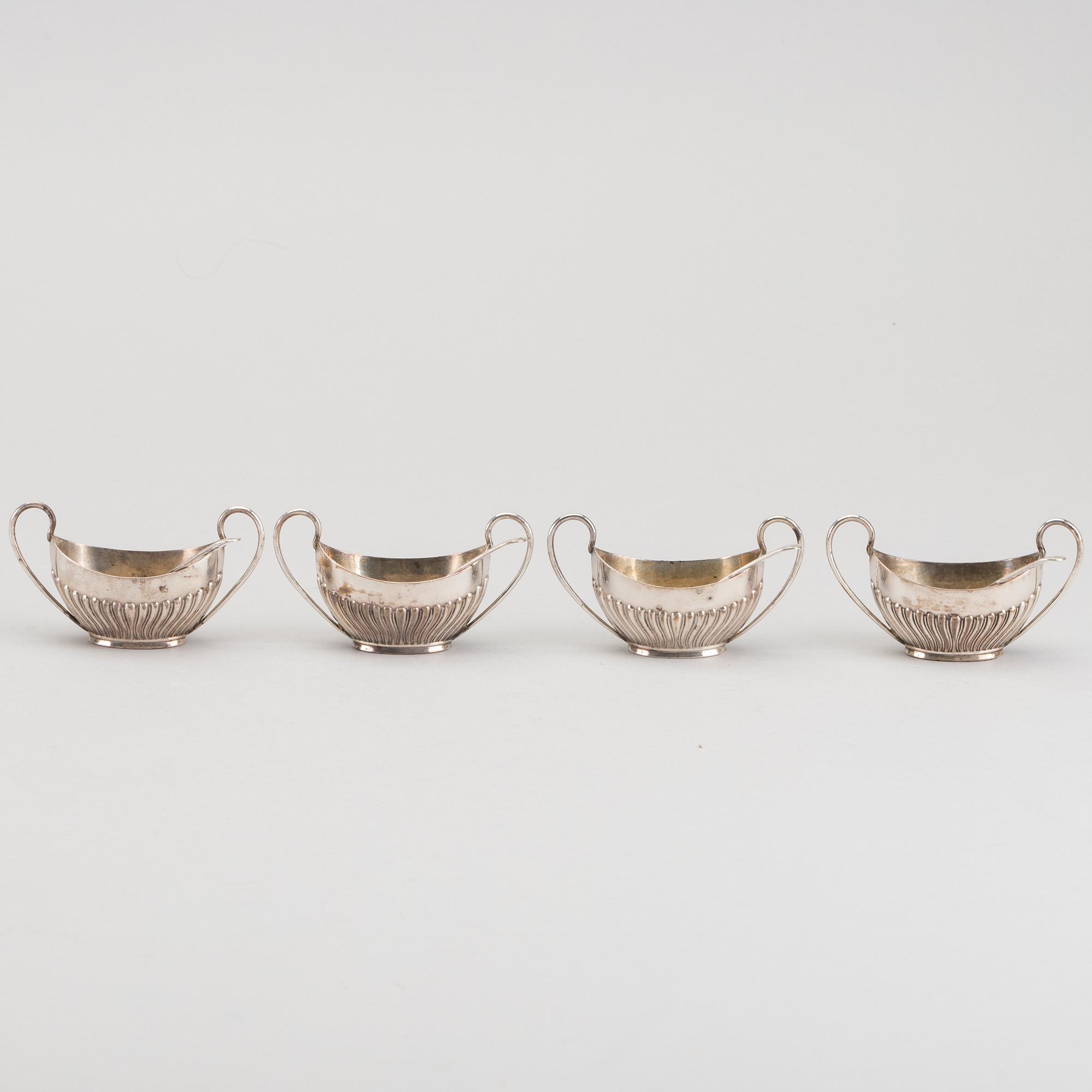 An English set of four silver salters with spoons mark of James Dixon & sons Sheffield 1895, weight 166 gr.
