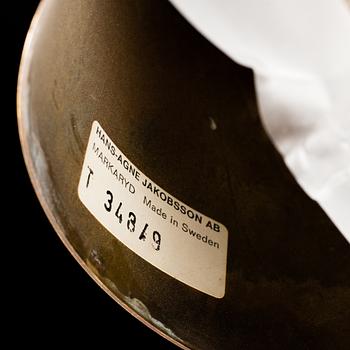 A 20th century brass and smoked glass chandelier by Hans Agne Jakobsson, Markaryd, Sweden.