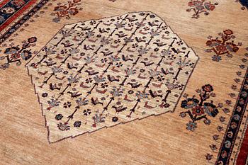 An oriental carpet, c. 325 x 210 cm.