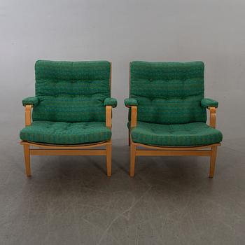 BRUNO MATHSSON, a pair  of easy chairs "Ingrid" for DUX.
