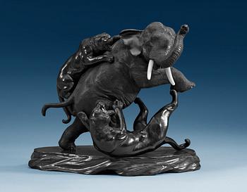 1505. A Japanese bronze figure of tigers attacking an elephant, ca 1900.