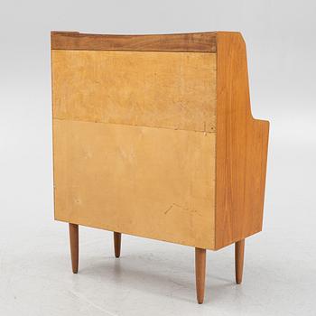 A teak writing desk, 1950-60s.