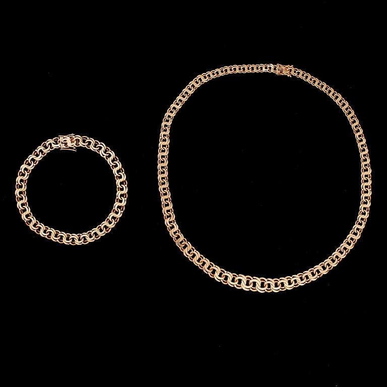 HALSKED och ARMKED. 14K guld. Bismarck. Vikt totalt ca 50,1 g.