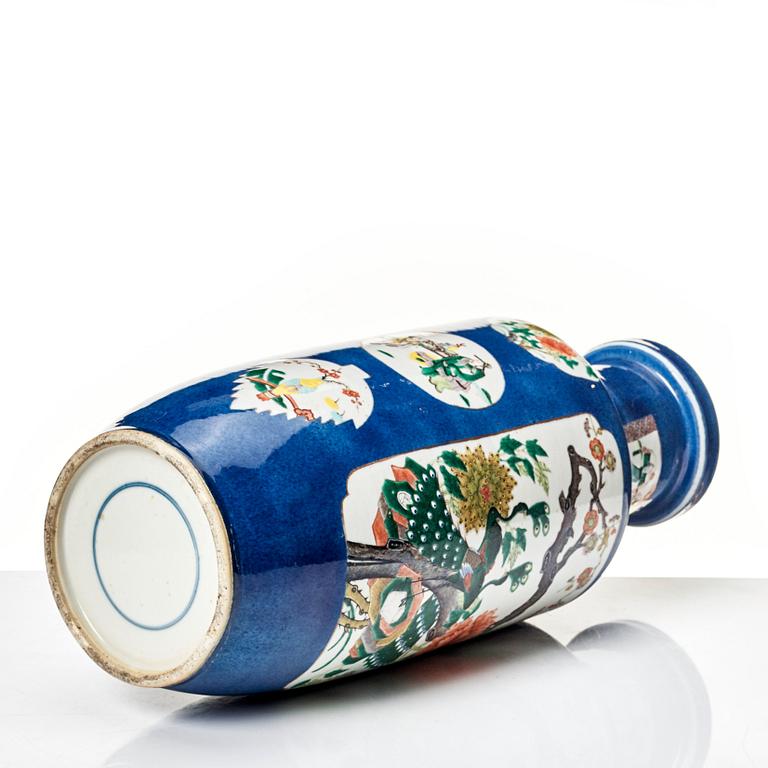 A powderblue and famille verte roleau vas, late Qing dynasty.