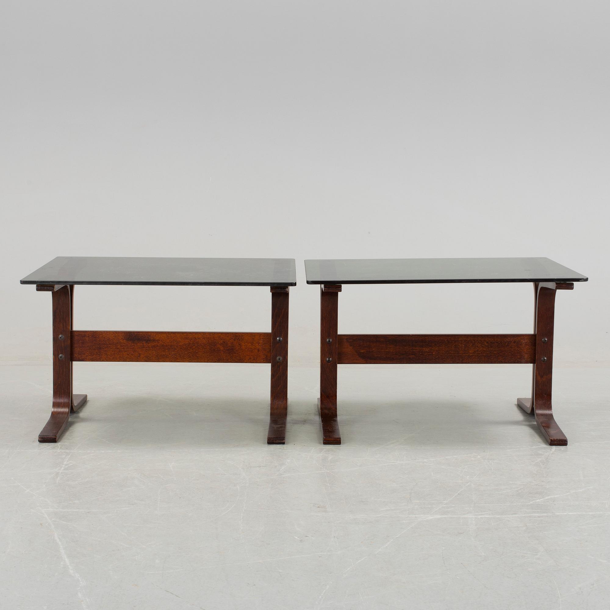 A pair of 1970s "Siesta", easy chairs and sofa tables by Ingmar Relling, Norge.