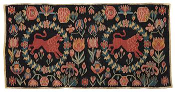 418. A cushion, 'Red Lion' (Rött Lejon), tapestry weave, c. 98 x 49 cm, Southwestern Scania, first part of the 19th century.