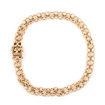 ARMBAND, 'X' länk.