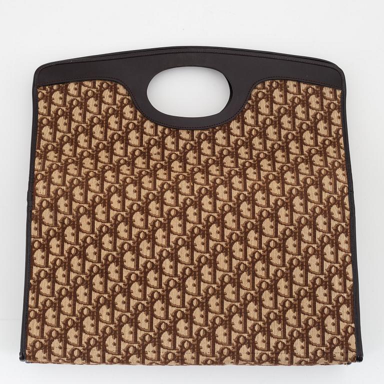 Christian Dior, a canvas tote bag.