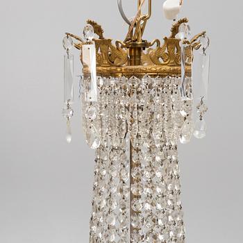 A ceiling light, circa 1900.