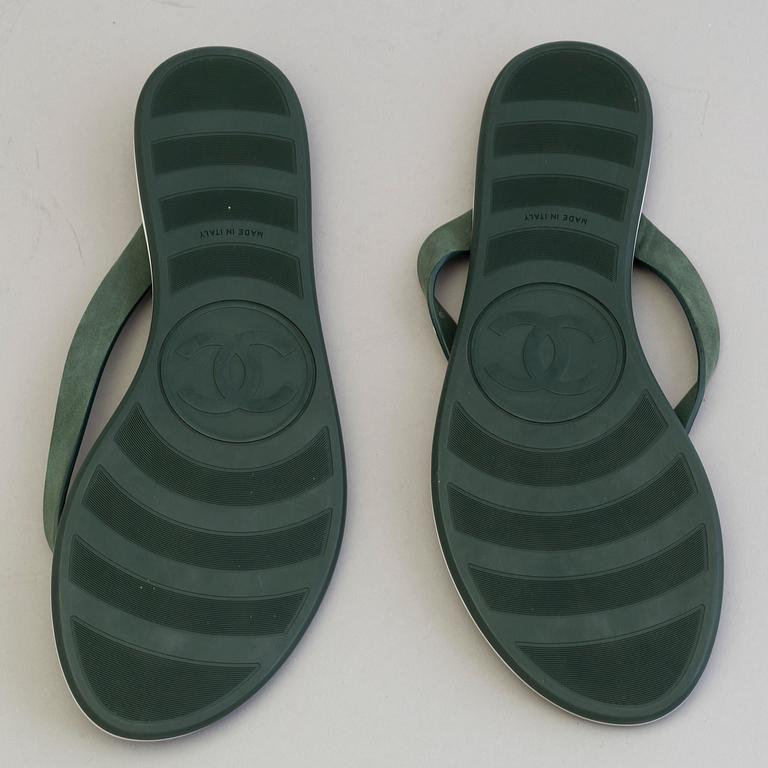 CHANEL, a pair of plastic flip-flop sandals, size 37.