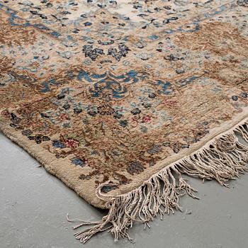 A Kerman carpet, around 360 x 262 cm.