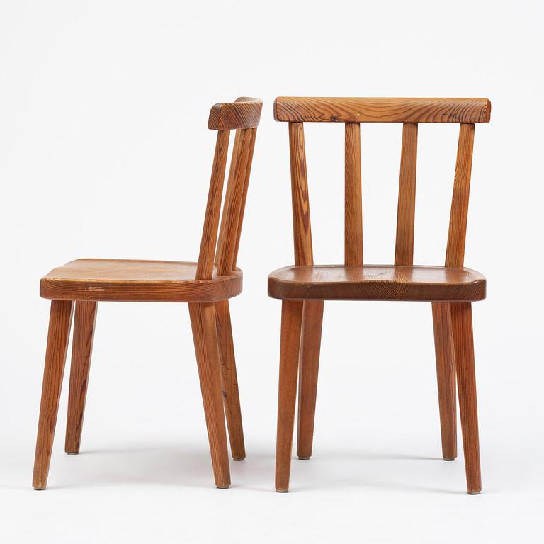 Axel Einar Hjorth, a set of six stained pine "Utö" chairs, Nordiska Kompaniet, Sweden, 1930s.