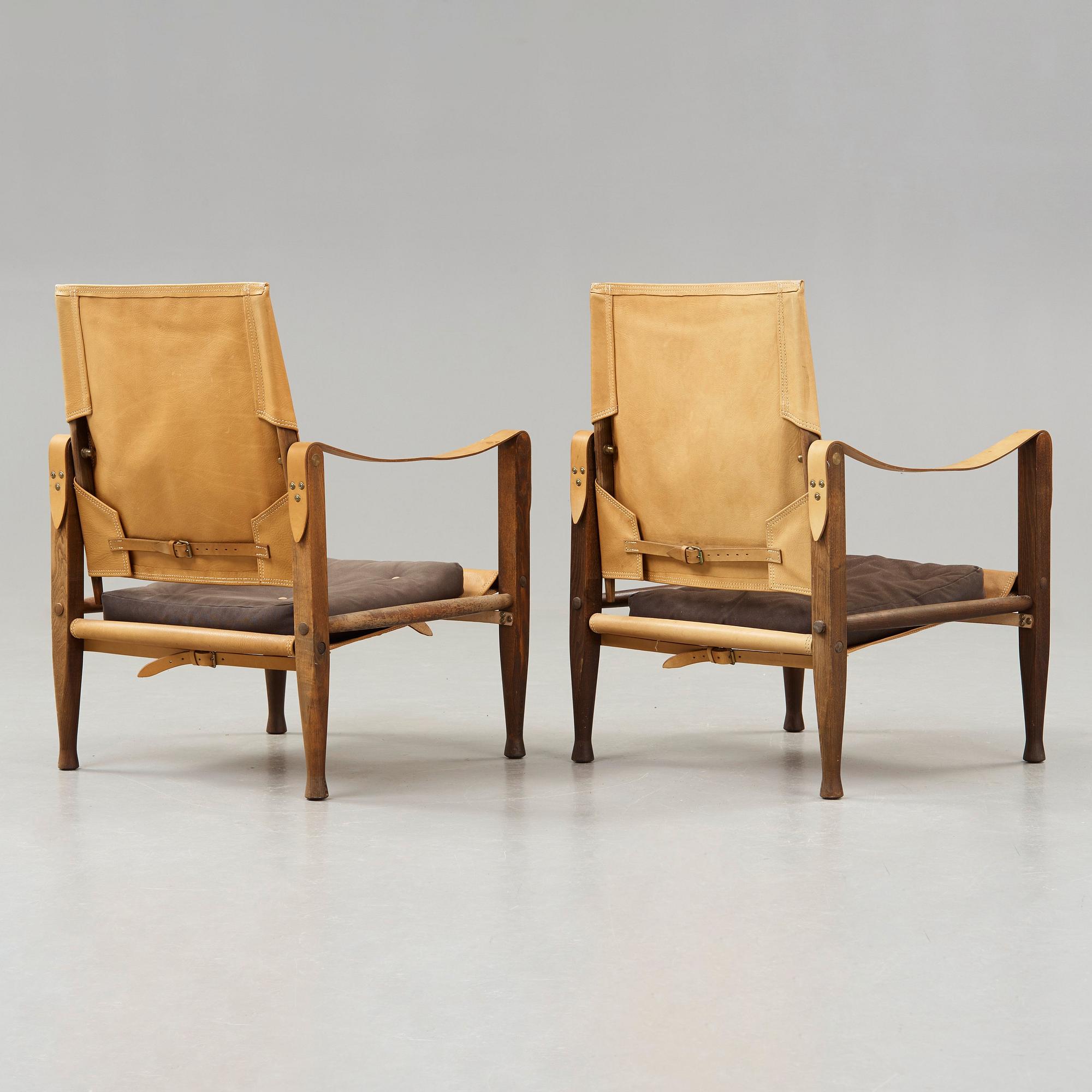 a pair of 'Safari' oak and leather armchairs, Rud. Rasmussen, Denmark, probably 1950's.