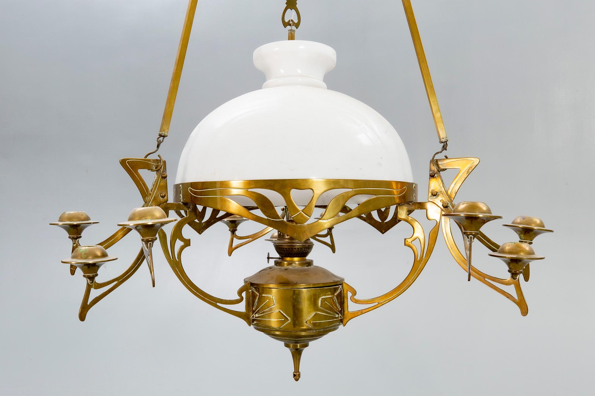 A Jugend brass celing paraffin lamp.