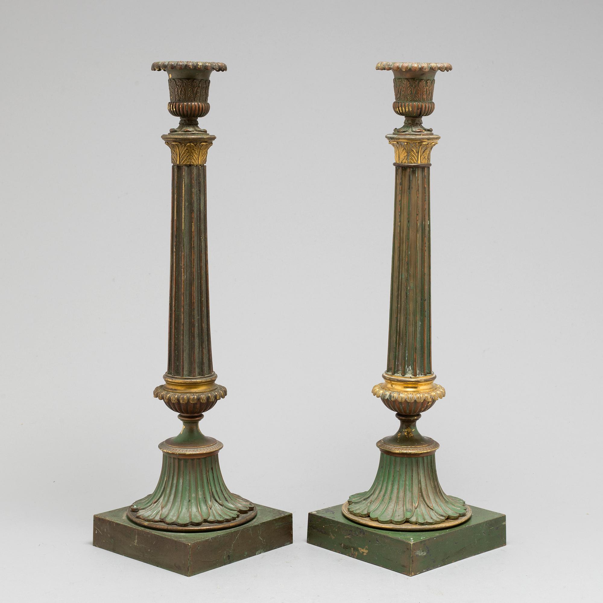 A pair of bronze gustavian candlesticks, late 18th century.