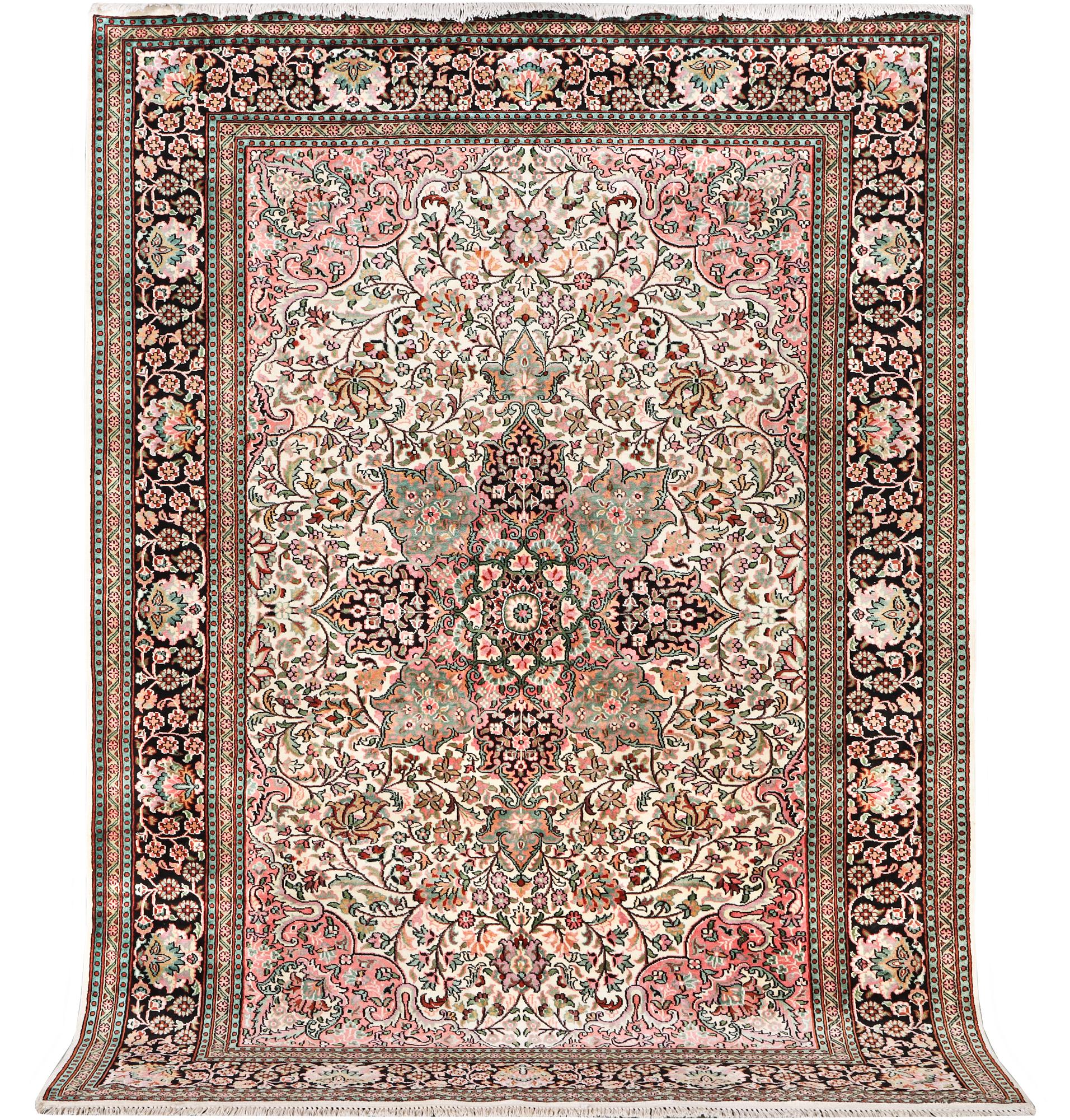 A silk Kashmir carpet, c. 267 x 185 cm.