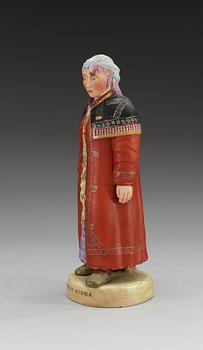 A Russian bisquit figure of a Khanty woman, Gardner (Dimitrovsk Porcelain Manufactory 1929-34),
