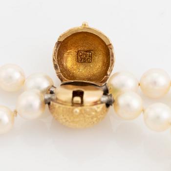 Ole Lynggaard, 18K gold clasp with two pearl necklaces.