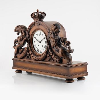 A mantel clock, early 20th Century.
