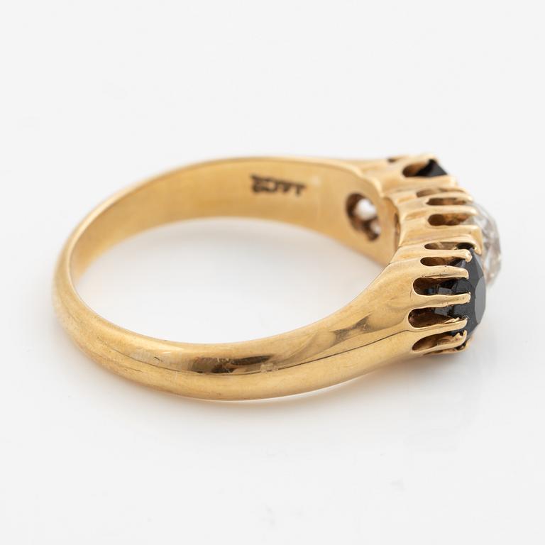 Ring 14K gold with an old-cut diamond and two blue stones.