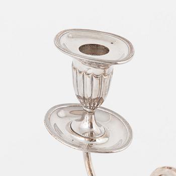 A pair of silver plated candelabra/candlesticks, England, first half of the 20th Century.