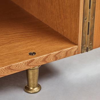 Bruno Mathsson, an elm veneered Swedish Modern sideboard executed by Karl Mathsson, Värnamo, Sweden 1938.