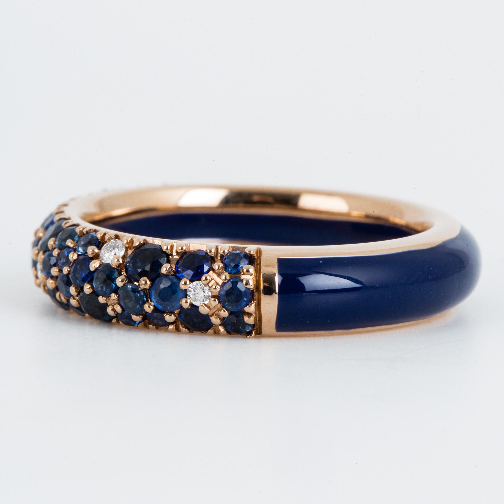 An enamel and brilliant cut diamond ring.