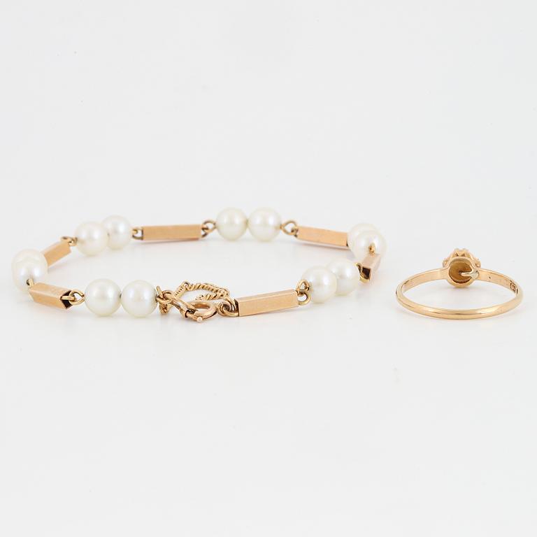 18K gold pearl bracelet and ring.