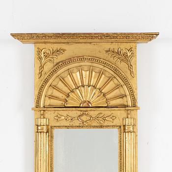 An Empire mirror, 1820.