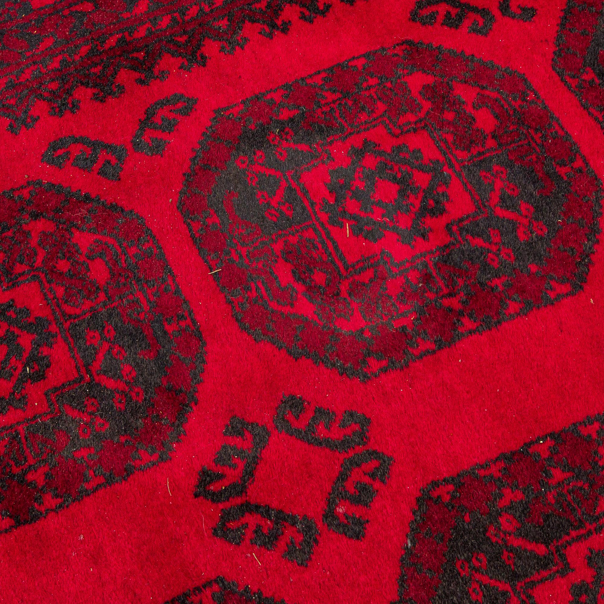 Two Afghan carpets. Ca. 326 x 217 and 88 x 63 cm.